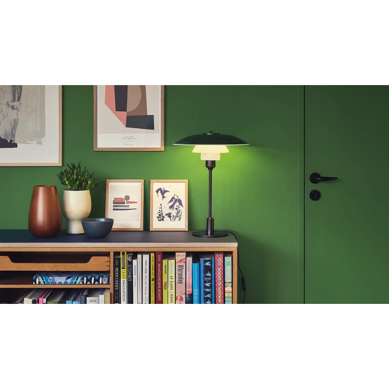 The PH 3½-2½ Table Lamp from Louis Poulsen in a home office,