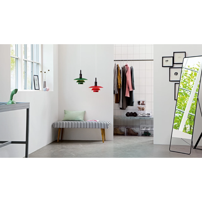 The PH 3½-3 Pendant Light from Louis Poulsen in a lounge lifestyle phtoograph.