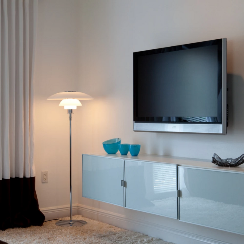 The PH 4½-3½ Floor Lamp from Louis Poulsen in a living room.
