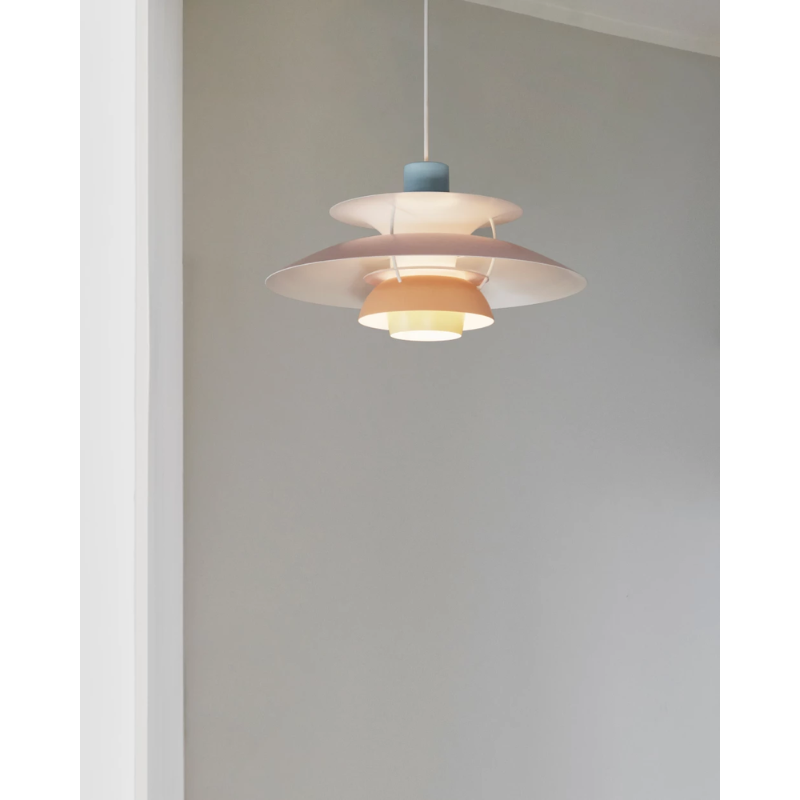 The PH 5 from Louis Poulsen in a home interior design shot highlighting the pendant.