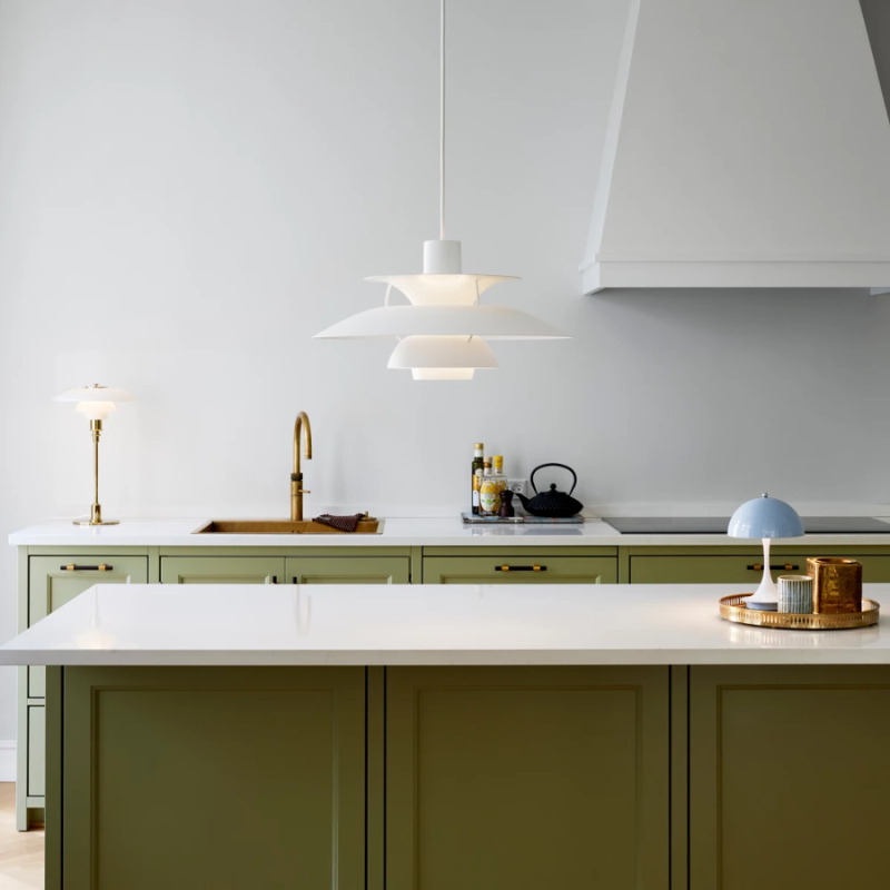 The PH 5 from Louis Poulsen in a kitchen.