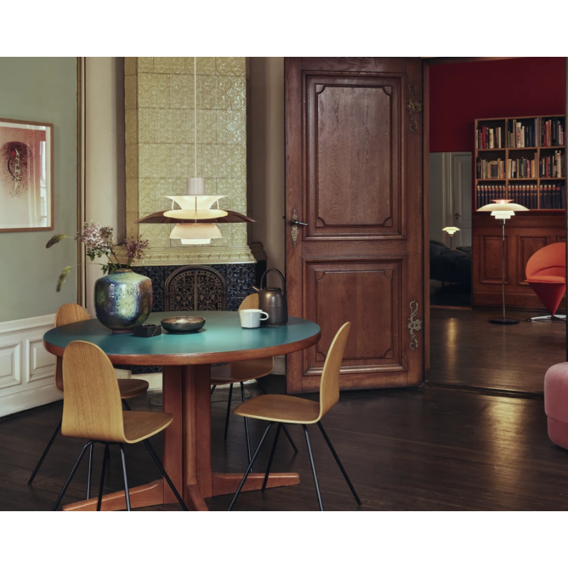 The PH 5 from Louis Poulsen in a living room.