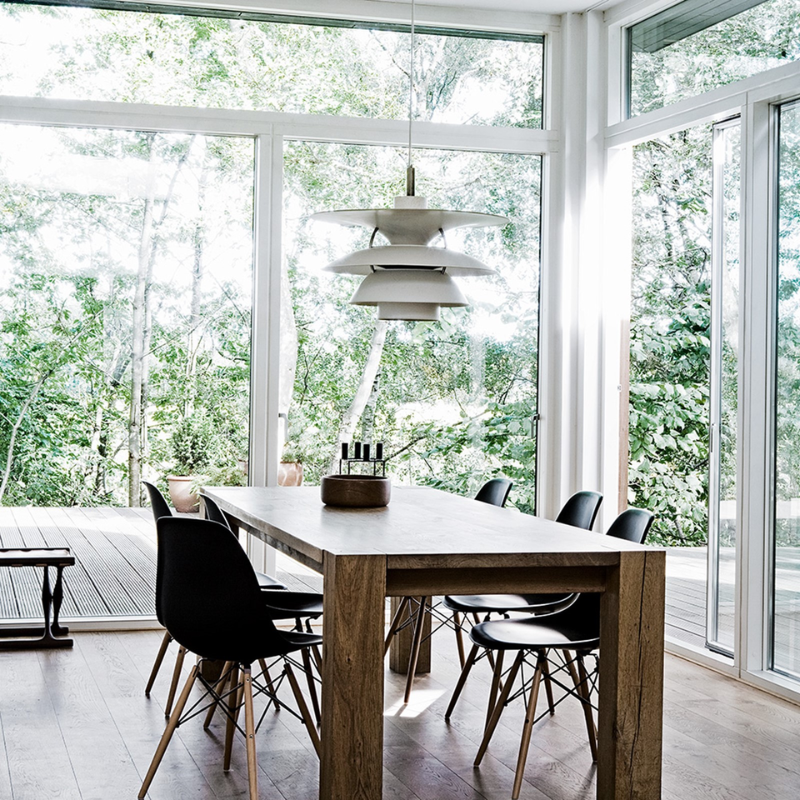 The PH 5-4½ or PH 6½-6 from Louis Poulsen in a dining room.