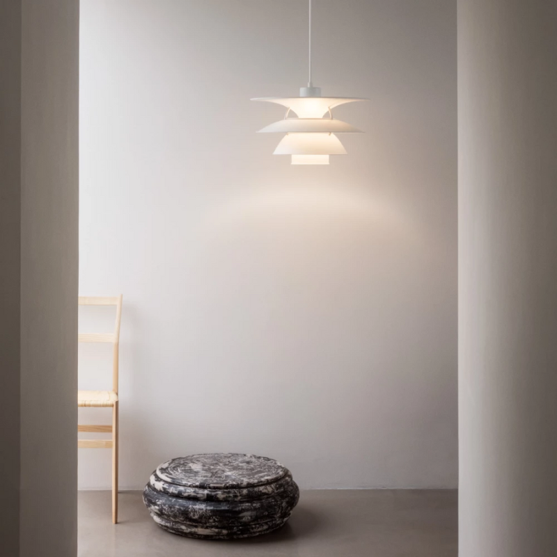 The PH 5-4½ or PH 6½-6 from Louis Poulsen in a living room.