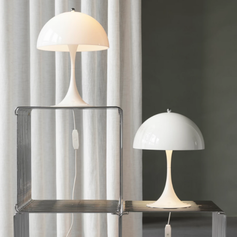 The Panthella 250 Table Lamp from Louis Poulsen in a home office.