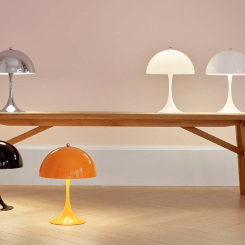 The Panthella 250 Table Lamp from Louis Poulsen in a shot showing the Panthella lighting collection.
