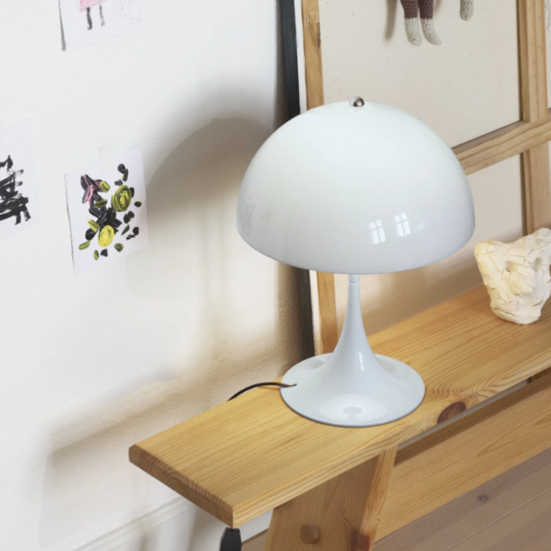 The Panthella 250 Table Lamp from Louis Poulsen in a living room.