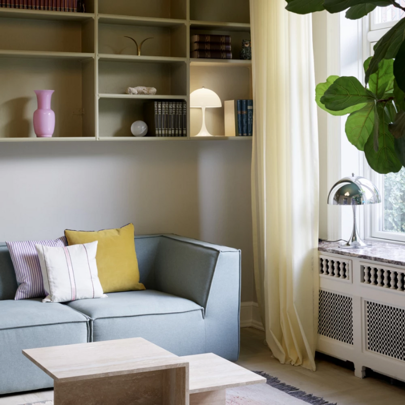 The Panthella 320 Table Lamp from Louis Poulsen in a den.