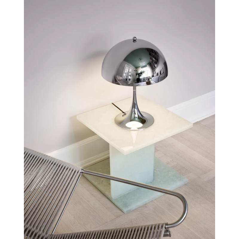 The Panthella 320 Table Lamp from Louis Poulsen used as home lighting.