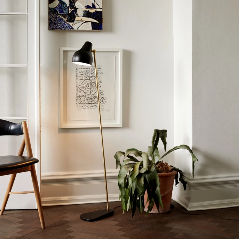 The VL38 Floor from Louis Poulsen in a living room.