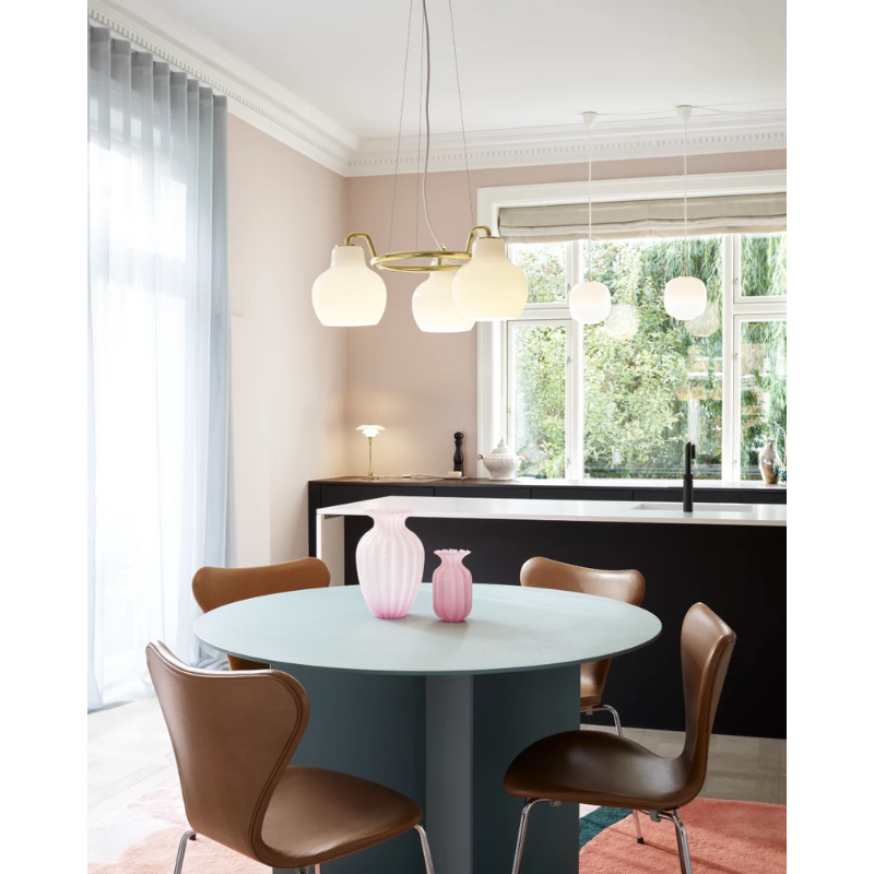 The VL Ring Crown from Louis Poulsen in a dining room.