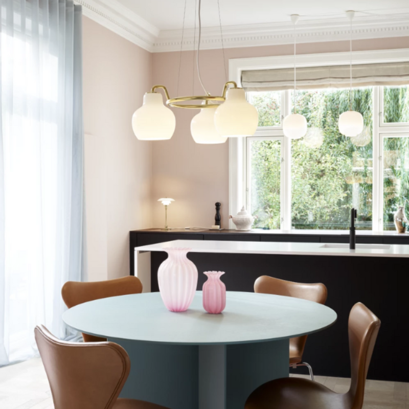 The VL Ring Crown from Louis Poulsen in a dining room.