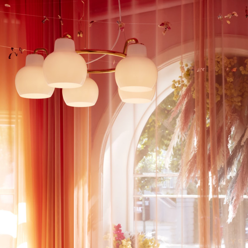 The VL Ring Crown from Louis Poulsen in a living room.