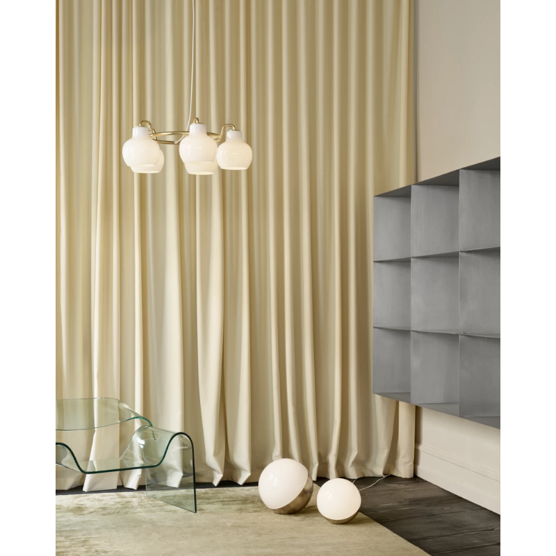 The VL Ring Crown from Louis Poulsen in a lounge lifestyle photograph.