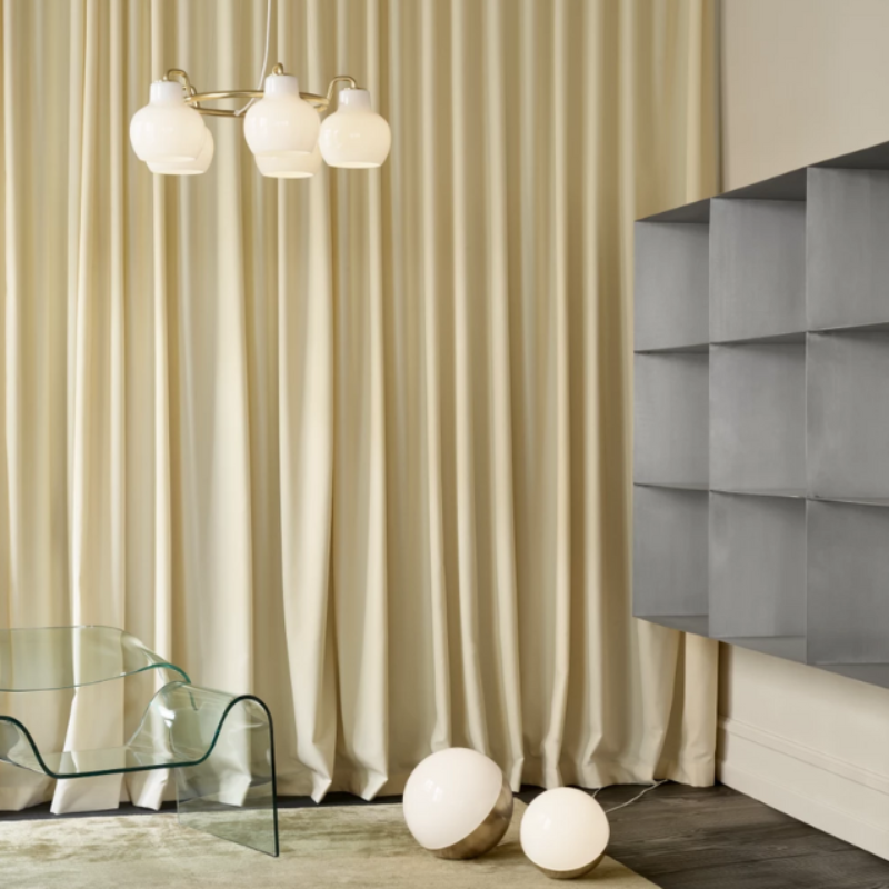 The VL Ring Crown from Louis Poulsen in a lounge lifestyle photograph.