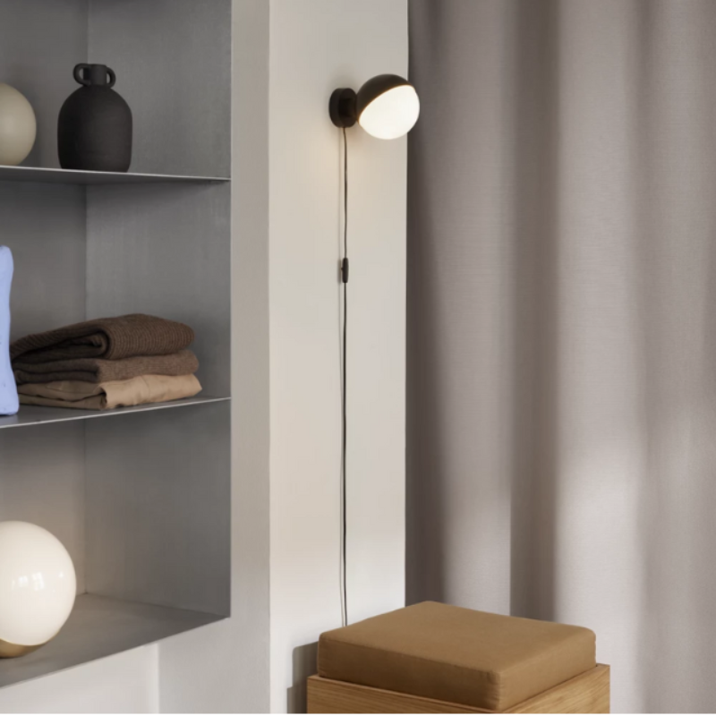 The VL Studio Wall from Louis Poulsen in a lounge lifestyle photograph.