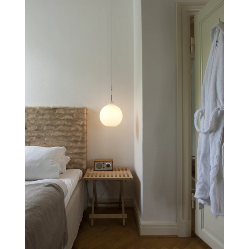 The Wohlert from Louis Poulsen in a bedroom.