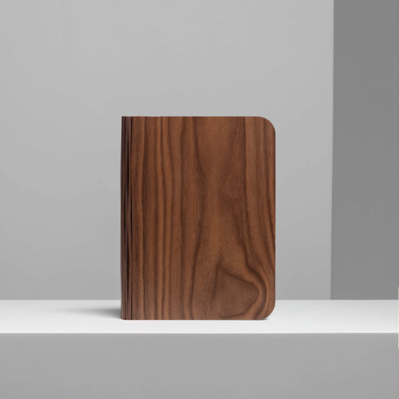 The Lito Classic Wood from Lumio in walnut in a studio.