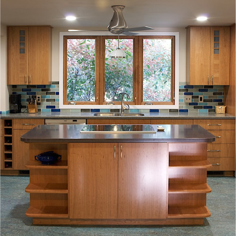 The Altus Flush over a cooking surface in the kitchen of a home.