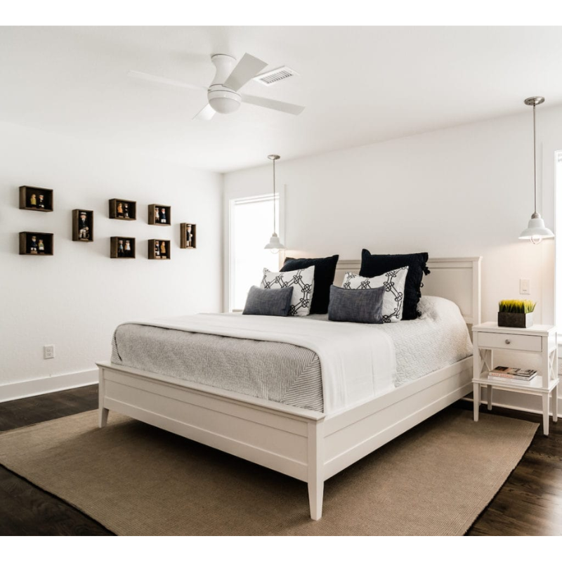 The Ball Flush LED ceiling fan from the Modern Fan Co. in a guest room.