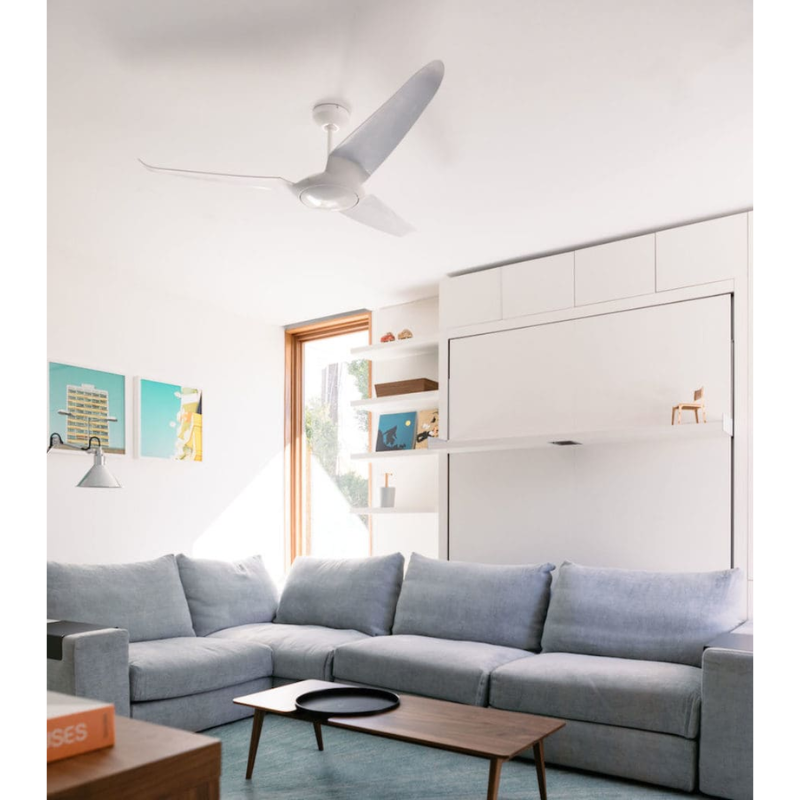 The IC/Air3 DC - 56″ from the Modern Fan Co. above a sofa in a living room.