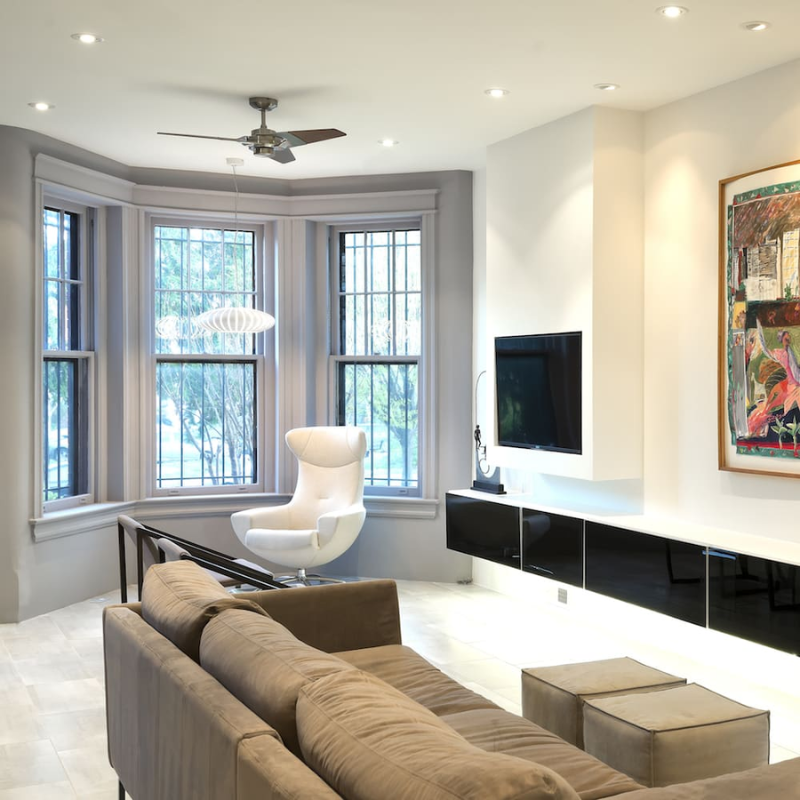 The Torsion 20W LED - 52" from The Modern Fan Co. in a family room.