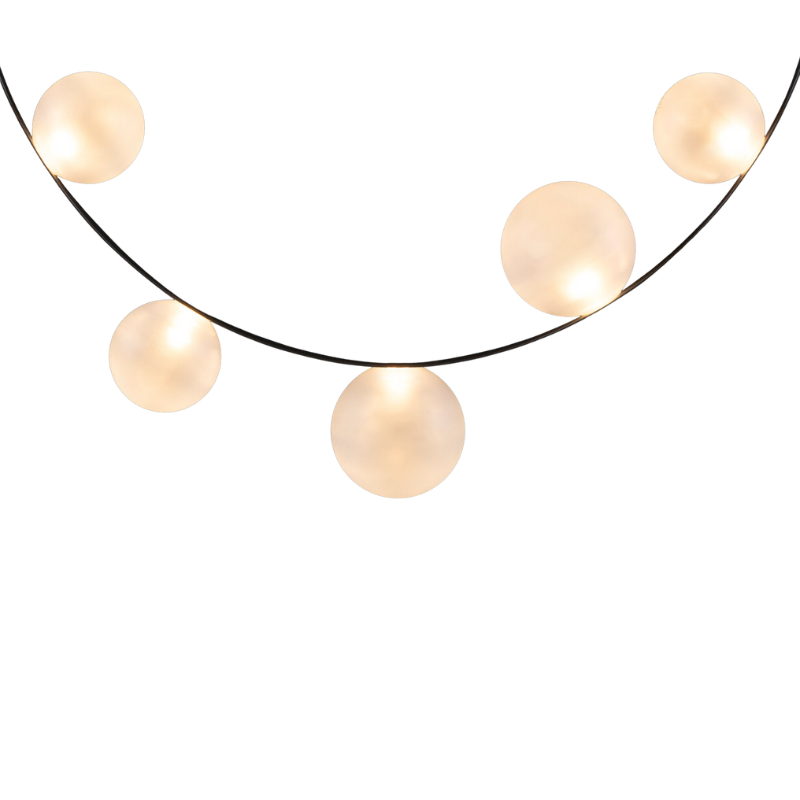 Hubble Bubble, designed by Marcel Wanders, is an airy and joyful suspension lamp. Available in two sizes, with either 7 or 11 glass LED bubbles in oil-iridescent or frosted versions. Hubble Bubble can be hung both horizontally and vertically and is powered through Electrosandwich® by Marcel Wanders. Hubble Bubble is the cheery statement piece in your home that can hang from any angle.