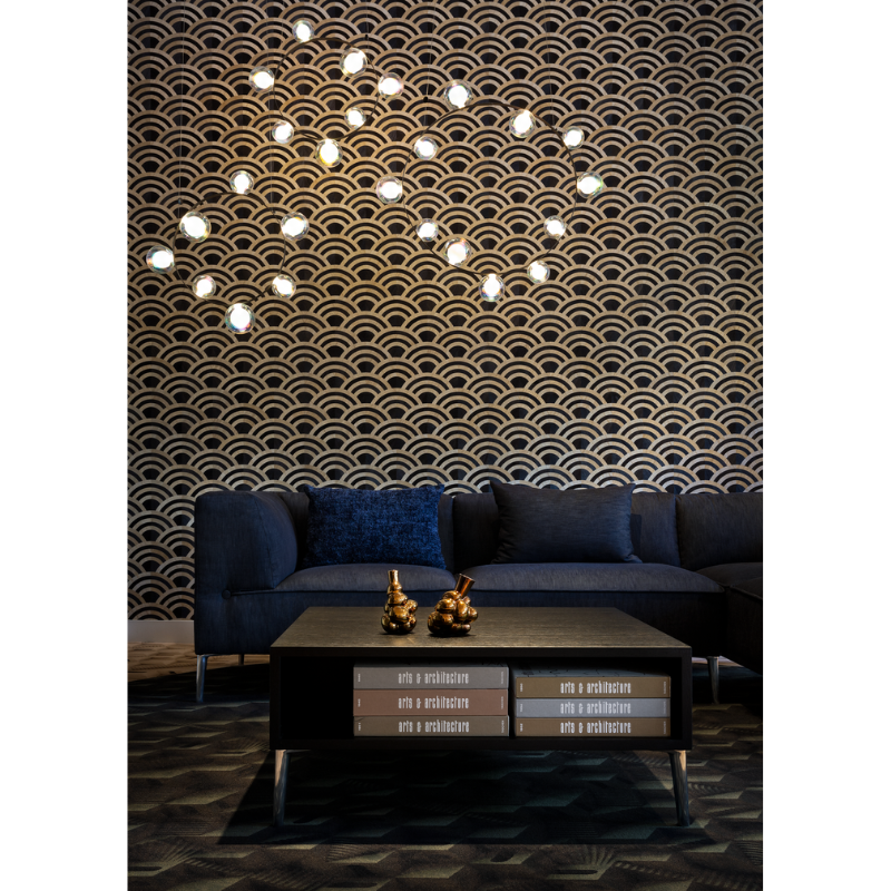 Hubble Bubble, designed by Marcel Wanders, is an airy and joyful suspension lamp. Available in two sizes, with either 7 or 11 glass LED bubbles in oil-iridescent or frosted versions. Hubble Bubble can be hung both horizontally and vertically and is powered through Electrosandwich® by Marcel Wanders. Hubble Bubble is the cheery statement piece in your home that can hang from any angle.