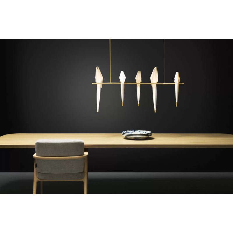 The Perch Linear Suspension from Moooi in a dining room.