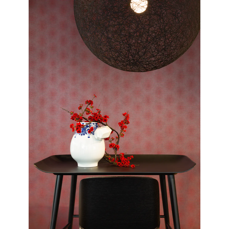 The Random II Pendant from Moooi in an artistic, table top setting.