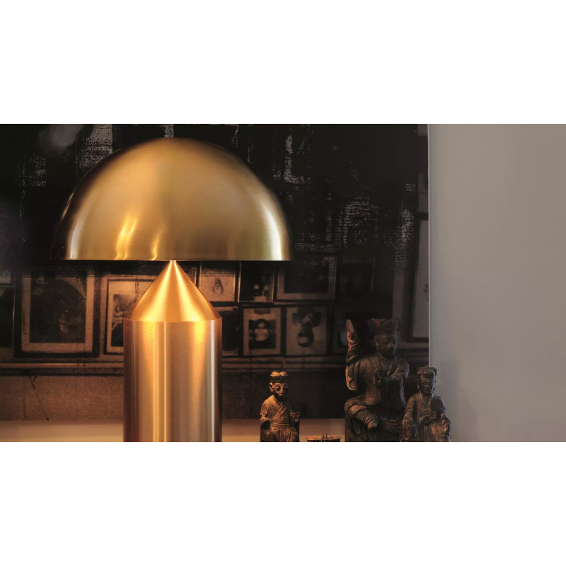 The Atollo Metal Table Lamp from Oluce in a home.