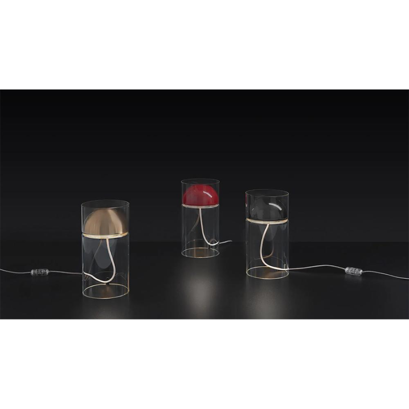 The Medusa from Oluce in a photograph of the lacquered black, satin gold and scarlet red color options. all-groups