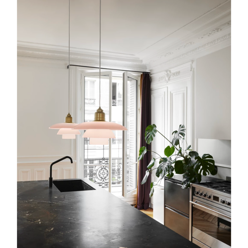 Inspired by Poul Henningsen’s fascination with the interplay between color and light, and the interior trends of today, the PH 3½-3 Pale Rose Brass Pendant features mouthblown pale rose-colored glass shades, which create a whimsical and poetic atmosphere in every room. The elegant expression is enhanced by the brushed brass detailing which, if left untreated, will patinate beautifully over time, giving the lamp character and charm.