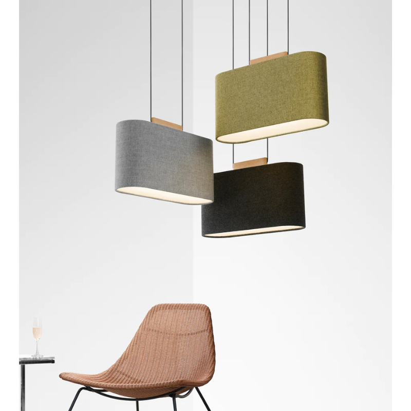 The Belmont Pendant from Pablo Designs in a lifestyle shot showing off the charcoal and silverdale colors.