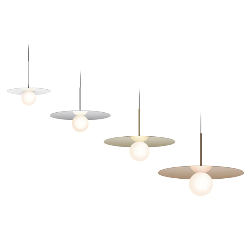 Four different sizes and color of the Bola Disc Pendant from Pablo Designs.