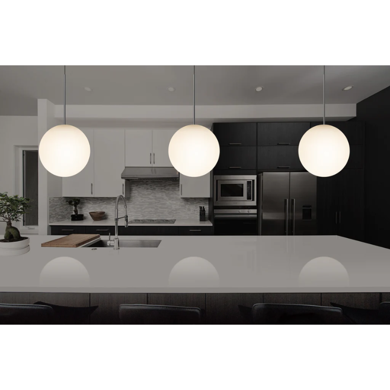 The Bola Sphere from Pablo Designs in a kitchen over the counter.