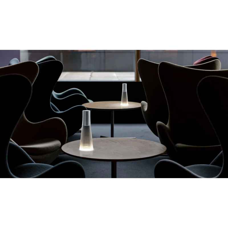 Inspired by a cone of light, Candél’s graceful vessel-like silhouette is in perfect harmony with its surroundings allowing the environment to filter through. Candél casts a warm, intimate candle-like glow that’s sure to seduce and become the central focus of any social gathering.