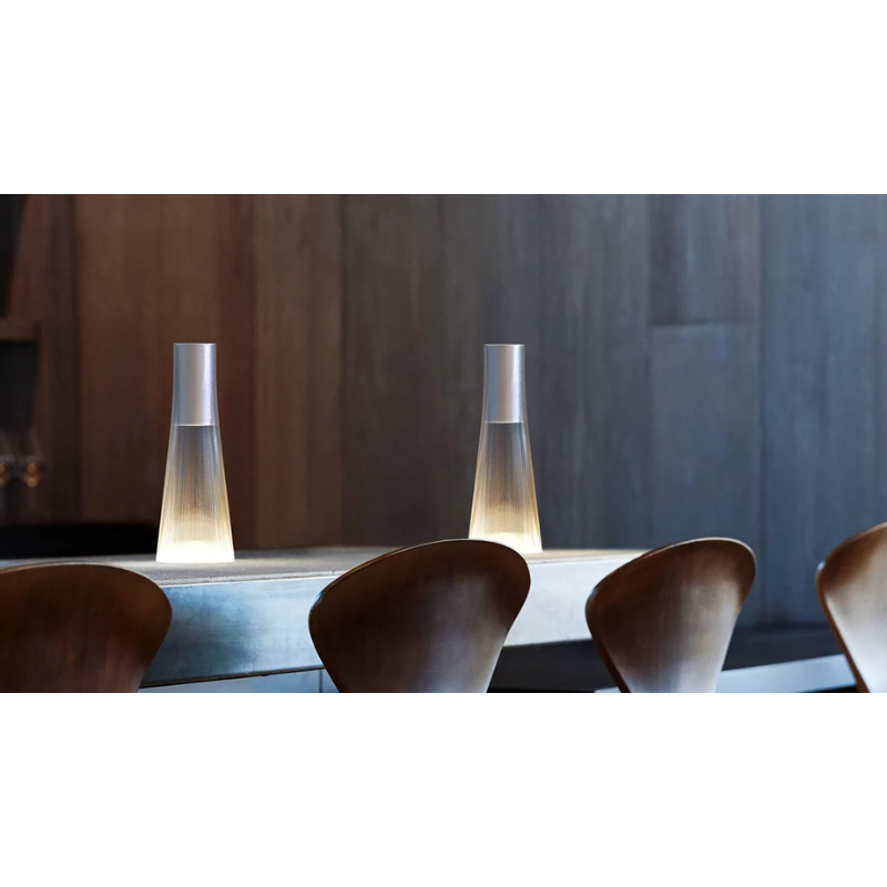 Inspired by a cone of light, Candél’s graceful vessel-like silhouette is in perfect harmony with its surroundings allowing the environment to filter through. Candél casts a warm, intimate candle-like glow that’s sure to seduce and become the central focus of any social gathering.