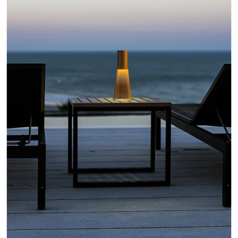 Inspired by a cone of light, Candél’s graceful vessel-like silhouette is in perfect harmony with its surroundings allowing the environment to filter through. Candél casts a warm, intimate candle-like glow that’s sure to seduce and become the central focus of any social gathering.