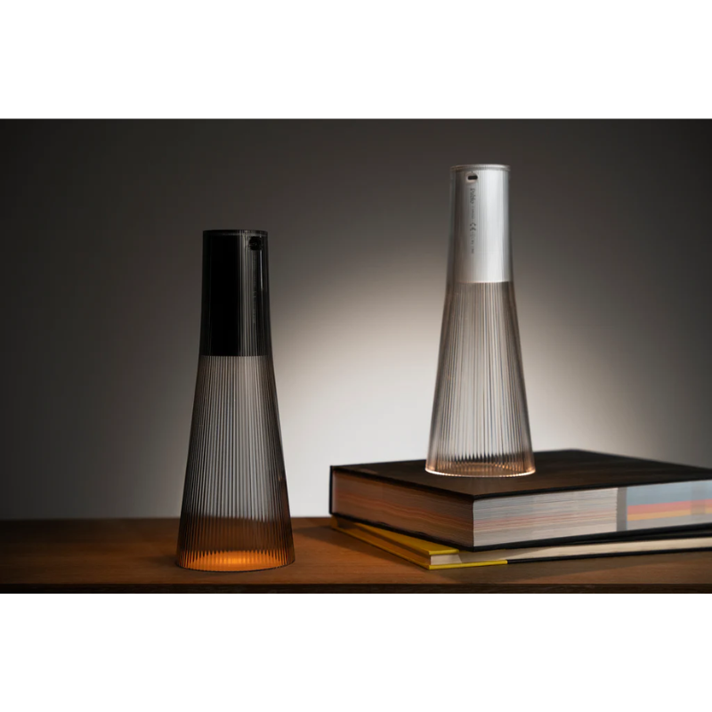 Inspired by a cone of light, Candél’s graceful vessel-like silhouette is in perfect harmony with its surroundings allowing the environment to filter through. Candél casts a warm, intimate candle-like glow that’s sure to seduce and become the central focus of any social gathering.