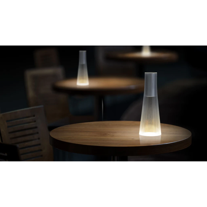 Inspired by a cone of light, Candél’s graceful vessel-like silhouette is in perfect harmony with its surroundings allowing the environment to filter through. Candél casts a warm, intimate candle-like glow that’s sure to seduce and become the central focus of any social gathering.