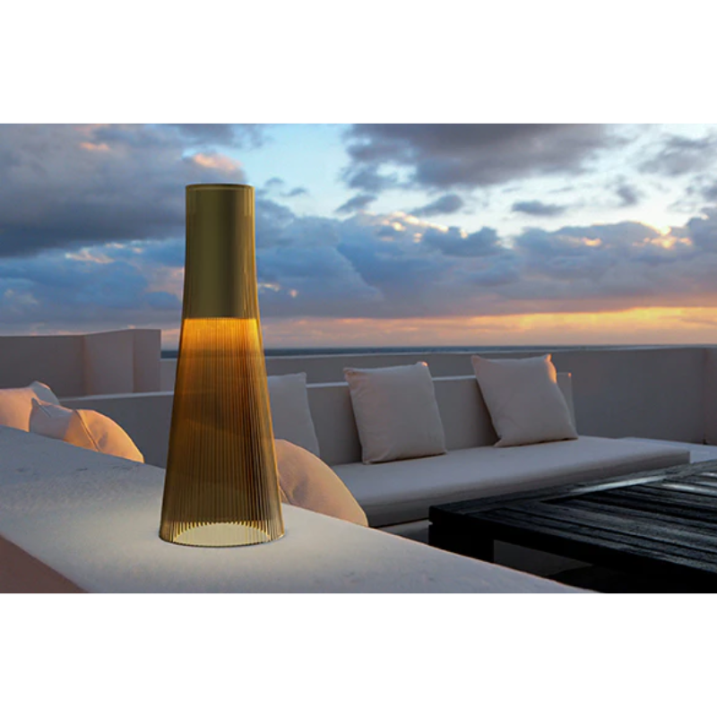 Inspired by a cone of light, Candél’s graceful vessel-like silhouette is in perfect harmony with its surroundings allowing the environment to filter through. Candél casts a warm, intimate candle-like glow that’s sure to seduce and become the central focus of any social gathering.