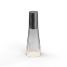 The Candel portable table lamp from Pablo Designs in smoke and black.