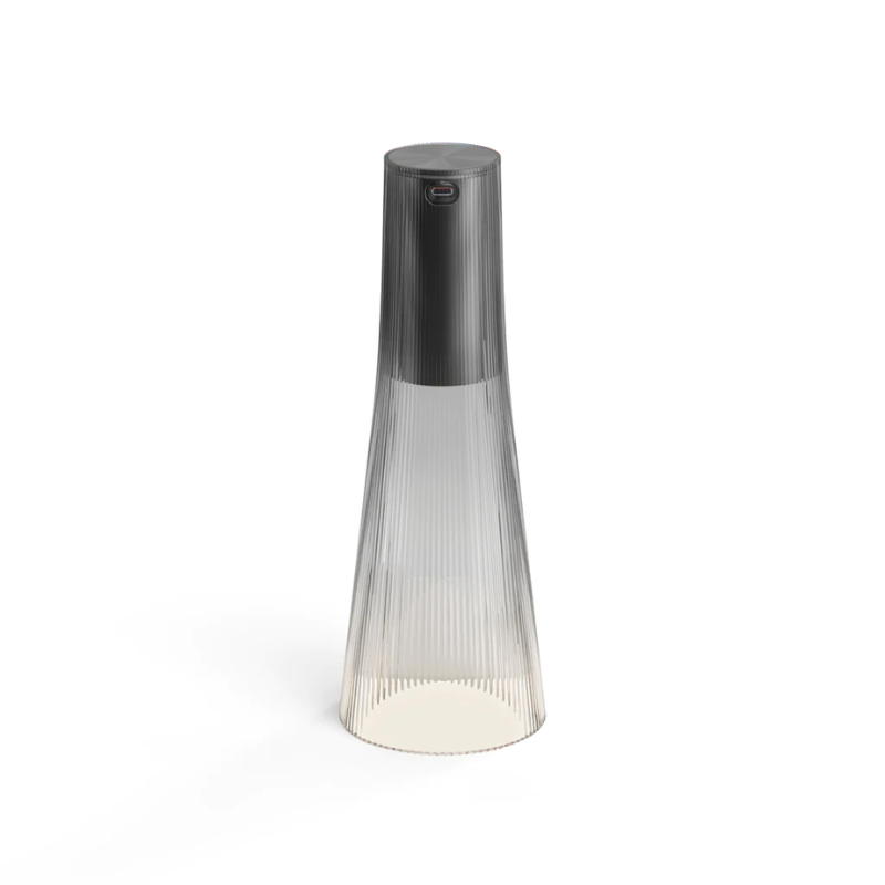 Inspired by a cone of light, Candél’s graceful vessel-like silhouette is in perfect harmony with its surroundings allowing the environment to filter through. Candél casts a warm, intimate candle-like glow that’s sure to seduce and become the central focus of any social gathering.
