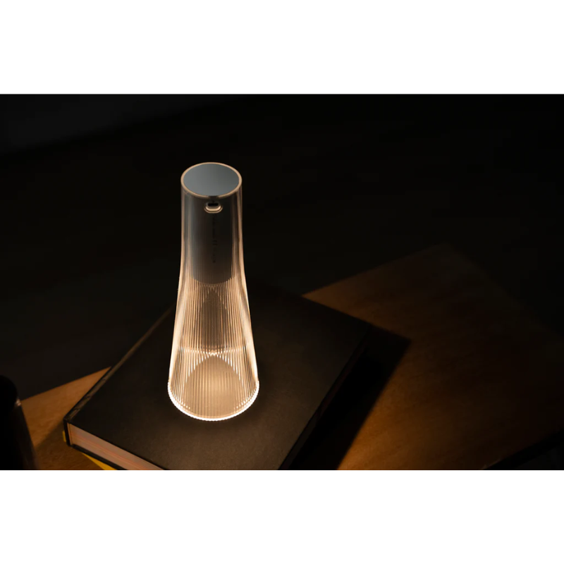 Inspired by a cone of light, Candél’s graceful vessel-like silhouette is in perfect harmony with its surroundings allowing the environment to filter through. Candél casts a warm, intimate candle-like glow that’s sure to seduce and become the central focus of any social gathering.
