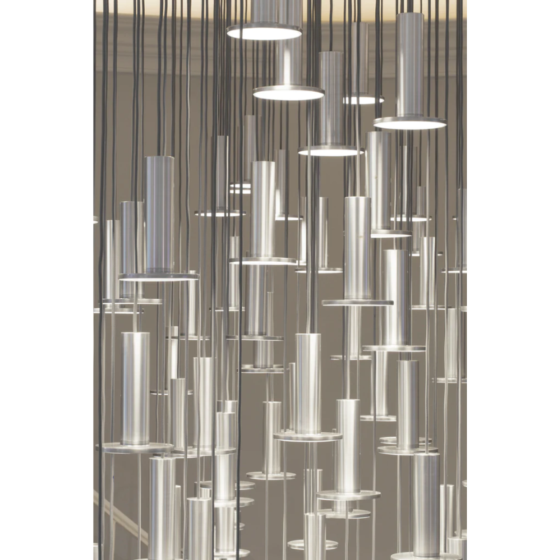 A close up on dozens of pendants from multiple Cielo Plus Chandeliers from Pablo Designs.