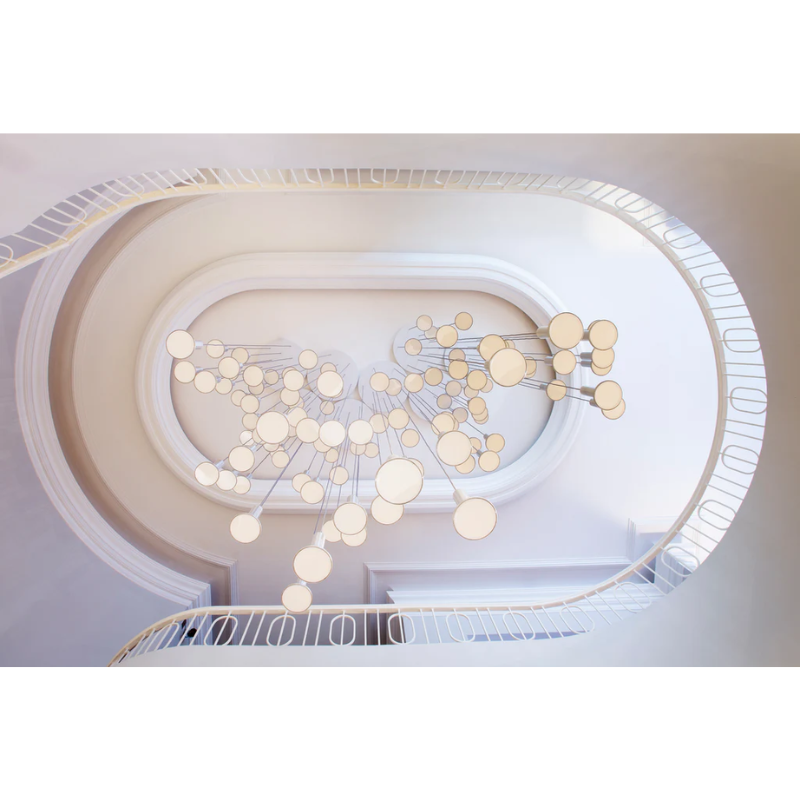 The Cielo Plus Chandelier from Pablo Designs in a lighting display.