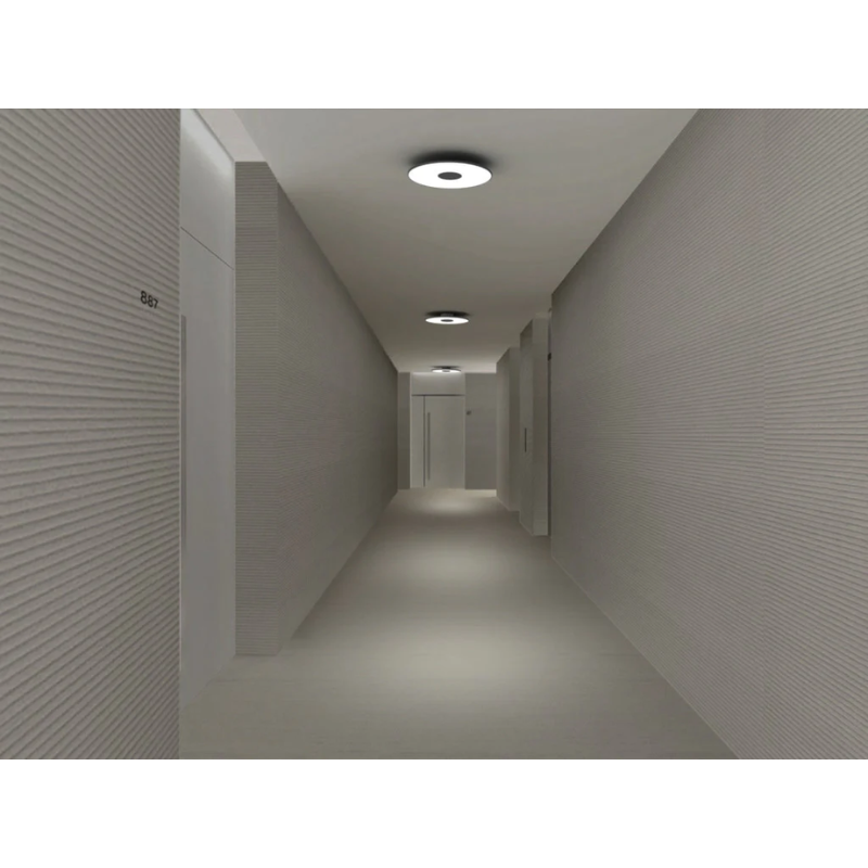 The Circa Flush from Pablo Designs being used in a lifestyle shot to illuminate a hallway.