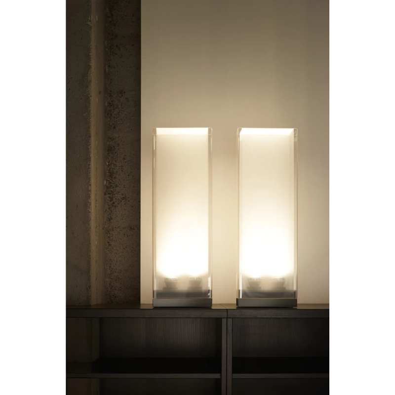 Two Cortina Table lamps in a living room lifestyle shot.