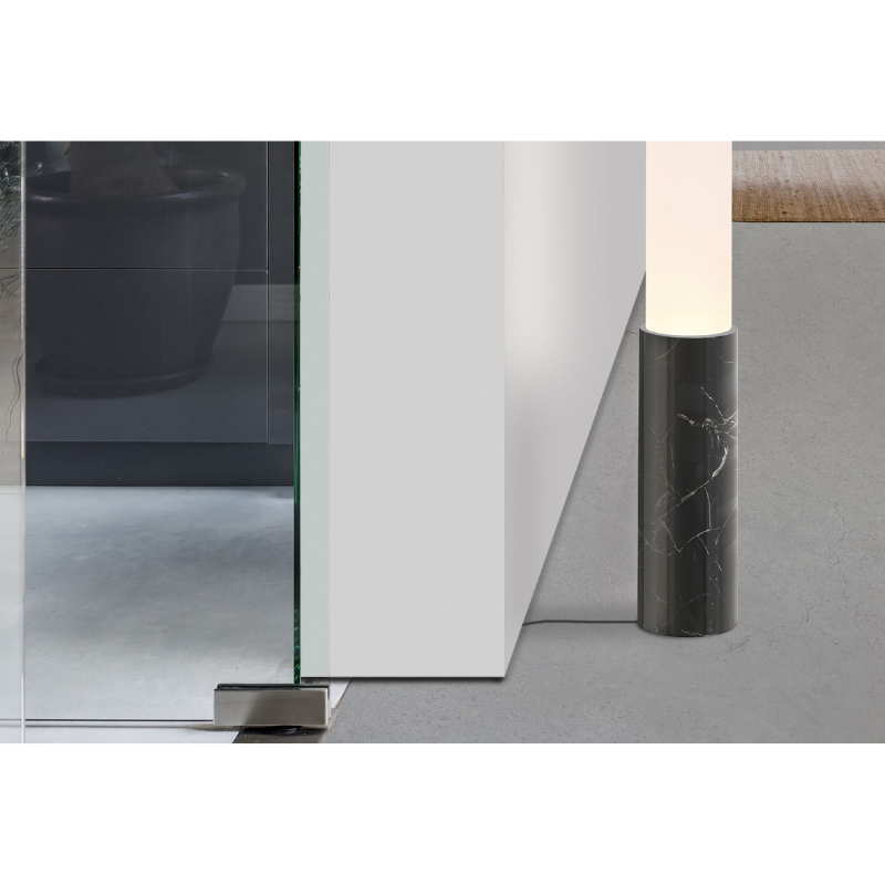 The Elise Floor from Pablo Designs next to the staircase close up with the marquina black marble base.